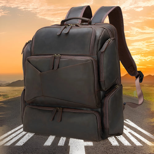Dark brown retro genuine leather backpack for men, open to show laptop compartment and internal organisers.