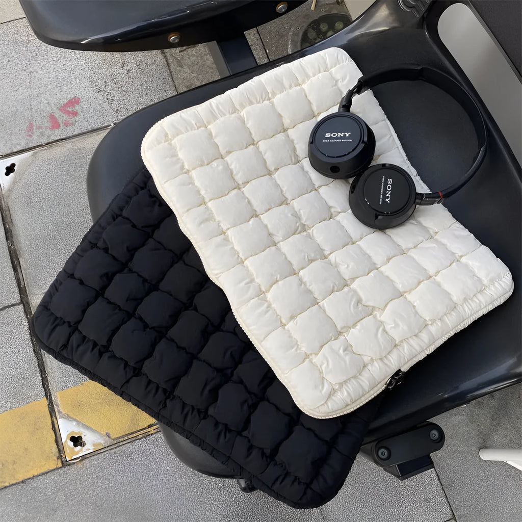 Large capacity laptop bag in black or white with durable nylon exterior and cloud cotton interior