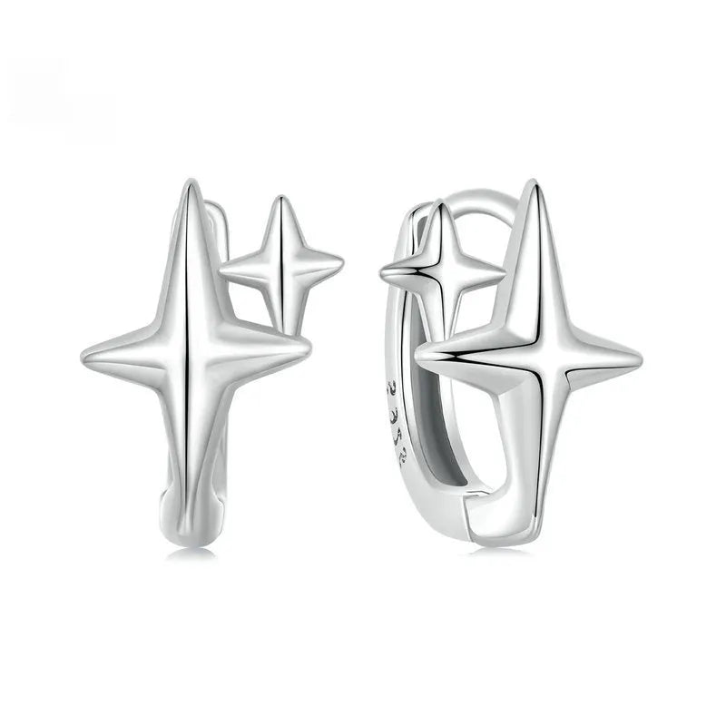 Minimalist star design clip-on earrings in sterling silver with oxidation treatment finish