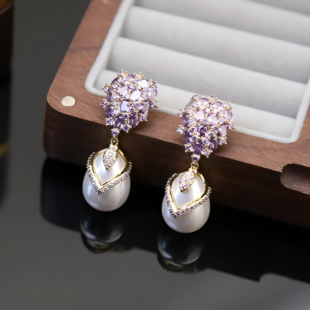Women's drop shape pearl earrings with zircon inlay in 18K gold tone copper, silver white colour