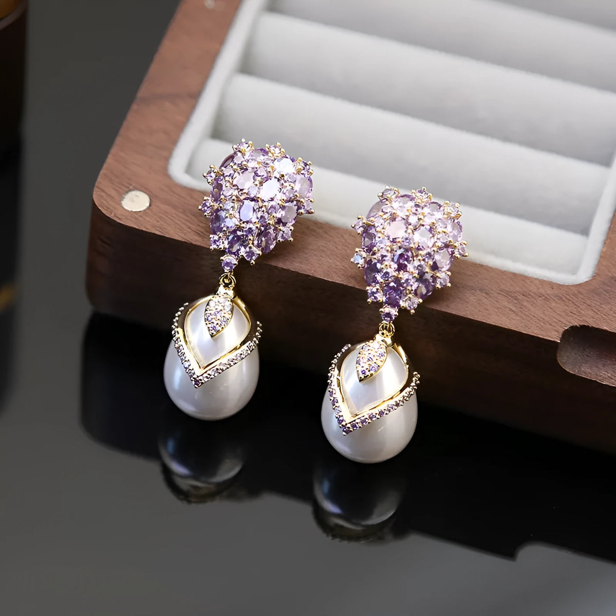 Women's drop shape pearl earrings with zircon inlay in 18K gold tone copper, silver white colour