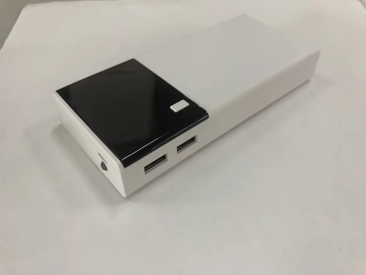 Black 20000mAh power bank measuring 135mm by 60mm with included charging cable