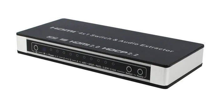 Black 4-input 1-output HDMI audio video switch with remote control on a table.