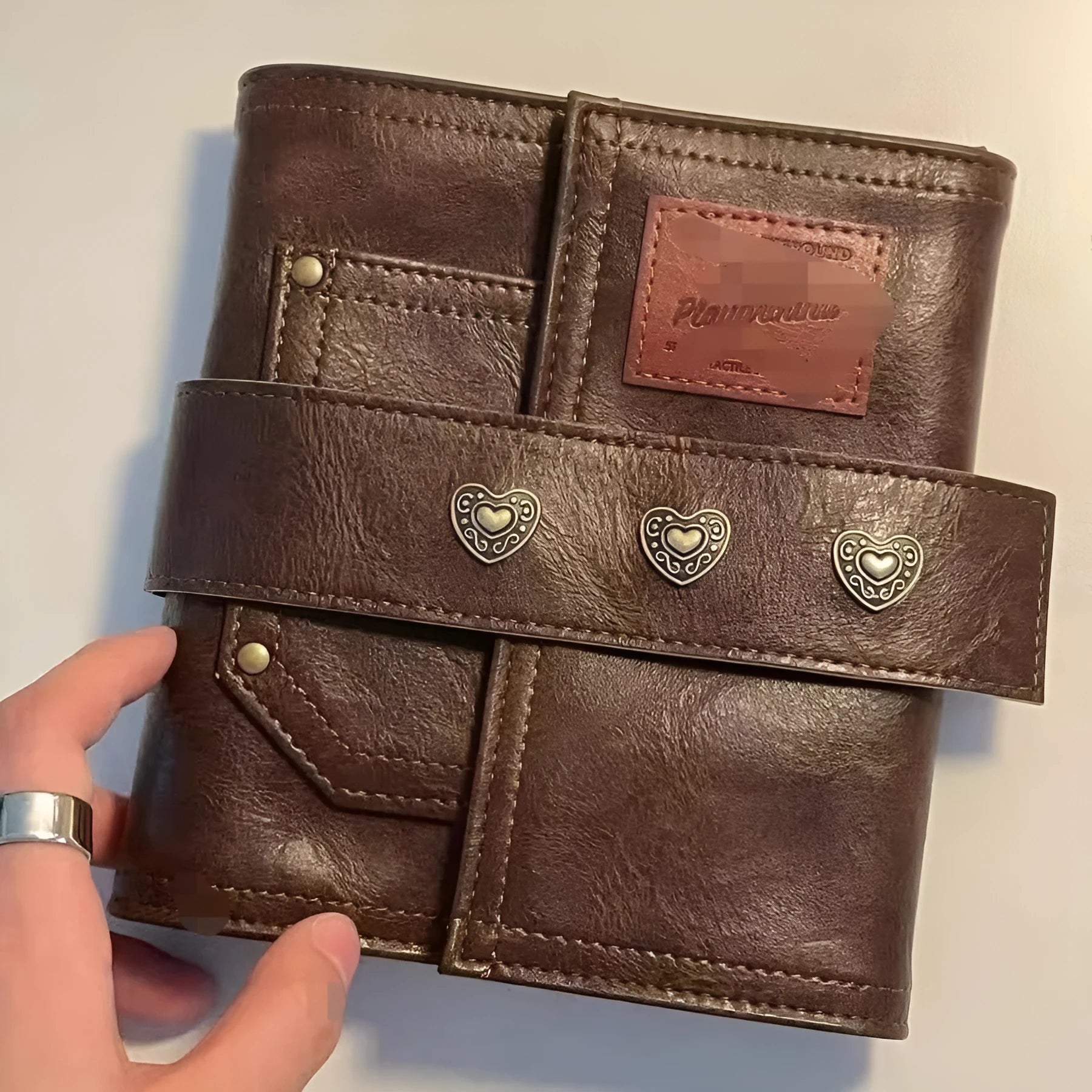 Brown A7 notebook with retro leather buckle and loose-leaf binding