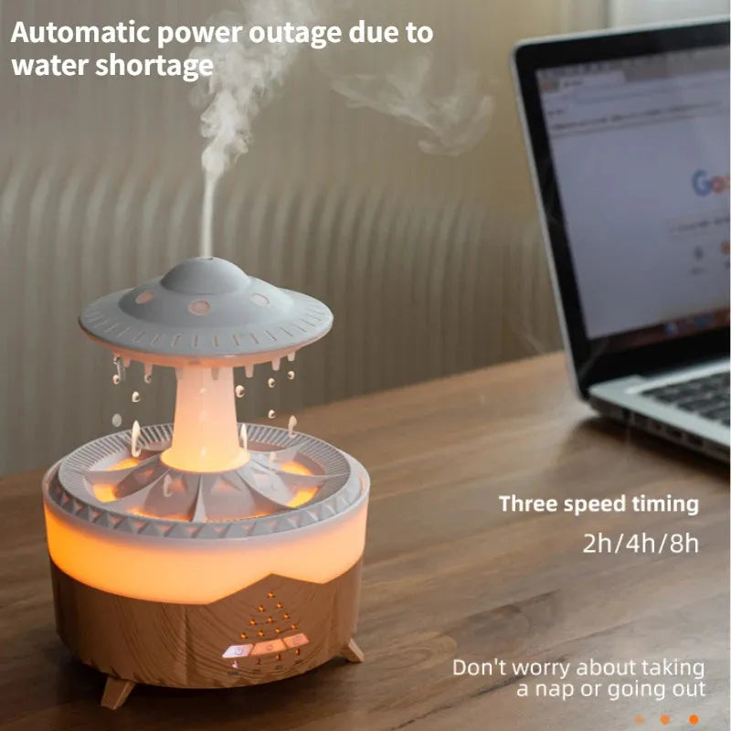 White UFO Raindrop Humidifier with 7-colour nightlight and essential oil diffuser on table
