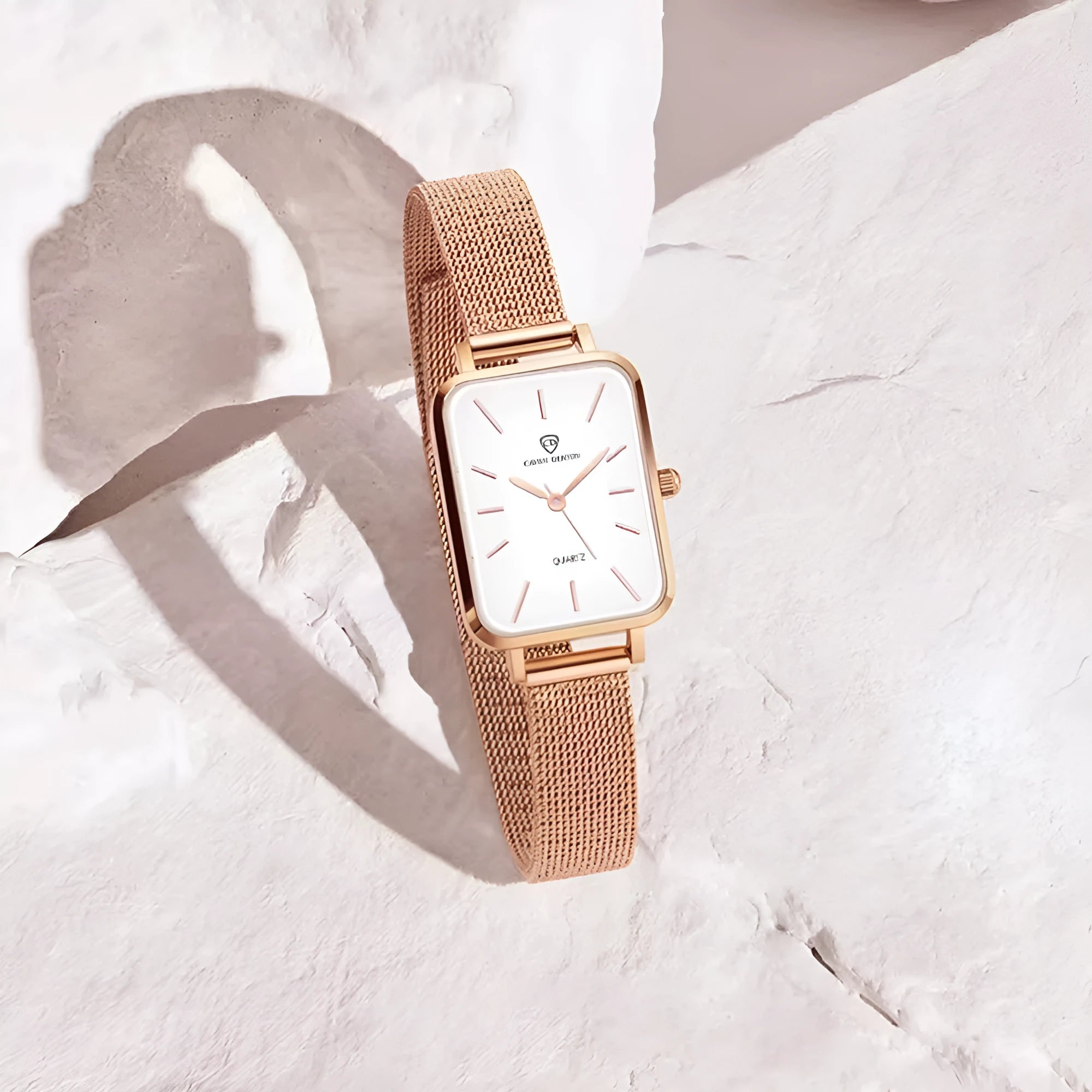 Women's quartz watch with alloy case, mineral glass, woven steel strap, rose gold or silver finishes, 30m waterproof