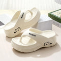 Pair of EVA flip flops with thick non-slip sole, fish mouth toe, available in beige, khaki, black and pink
