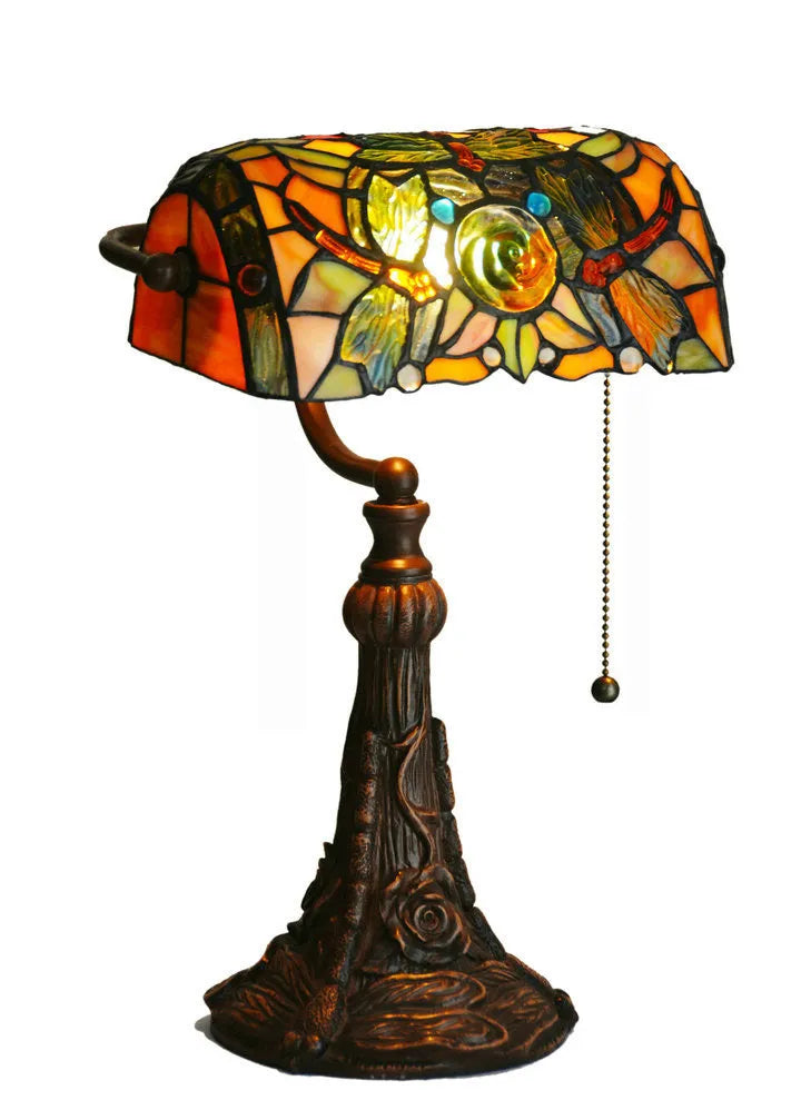 10-inch Tiffany table lamp with stained glass design and resin base on wooden desk