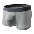 Men's black Ice Silk mesh boxer shorts laid flat, showing low-rise waistband and breathable fabric texture.