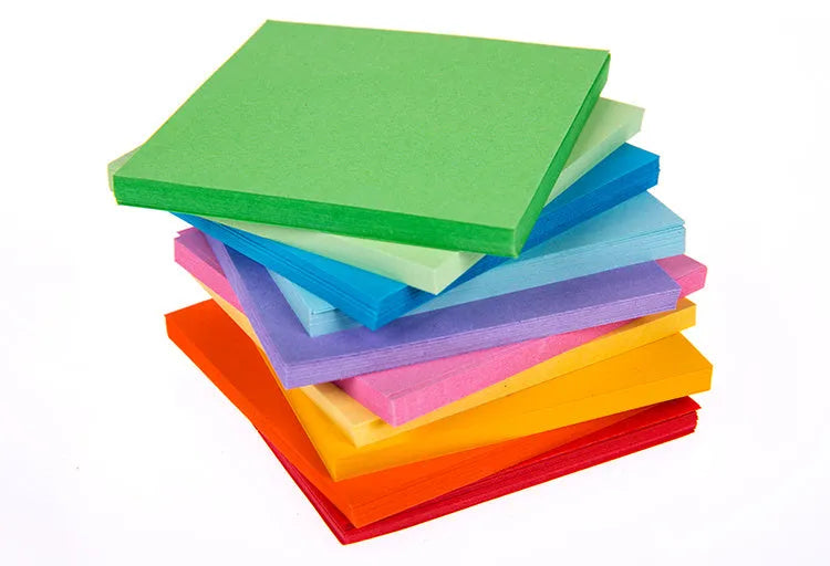 Assorted coloured paper scrolls in small sizes with a metal eyelet for hanging.