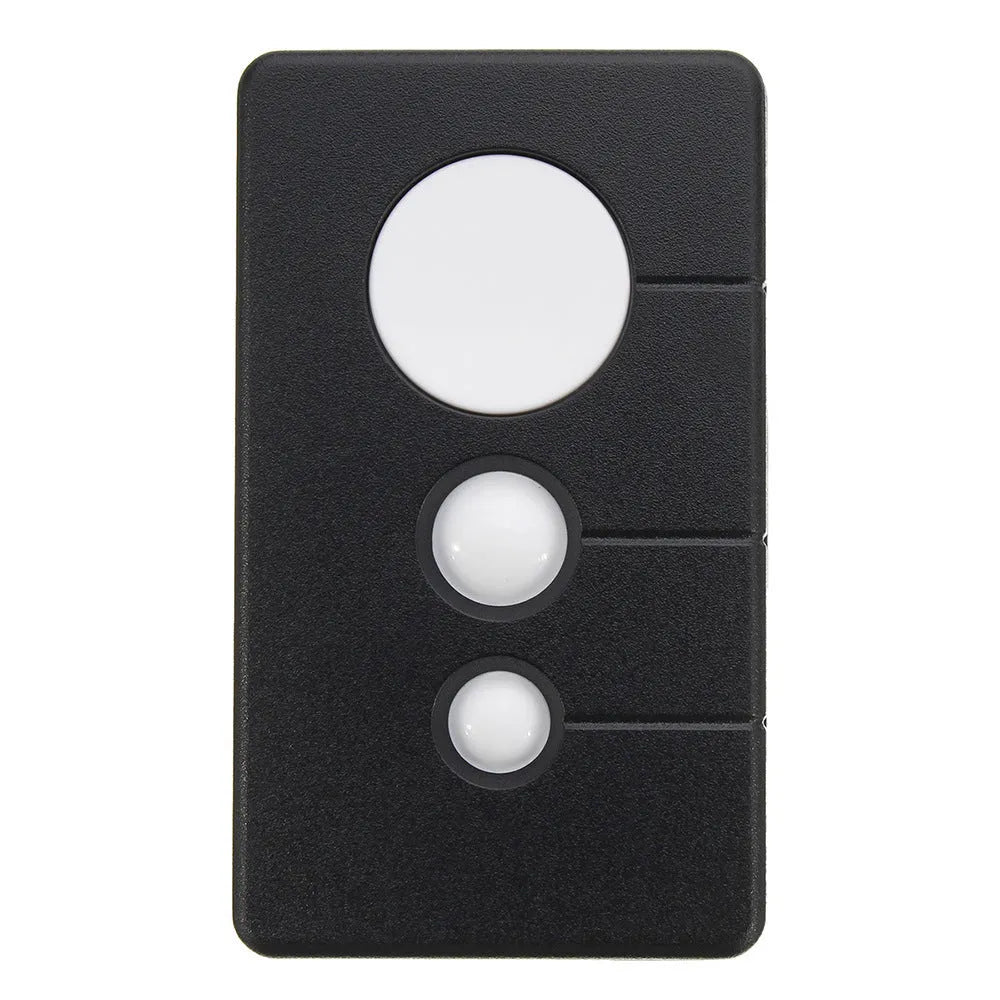 Black plastic three-button garage door remote control next to a CR2032 battery.