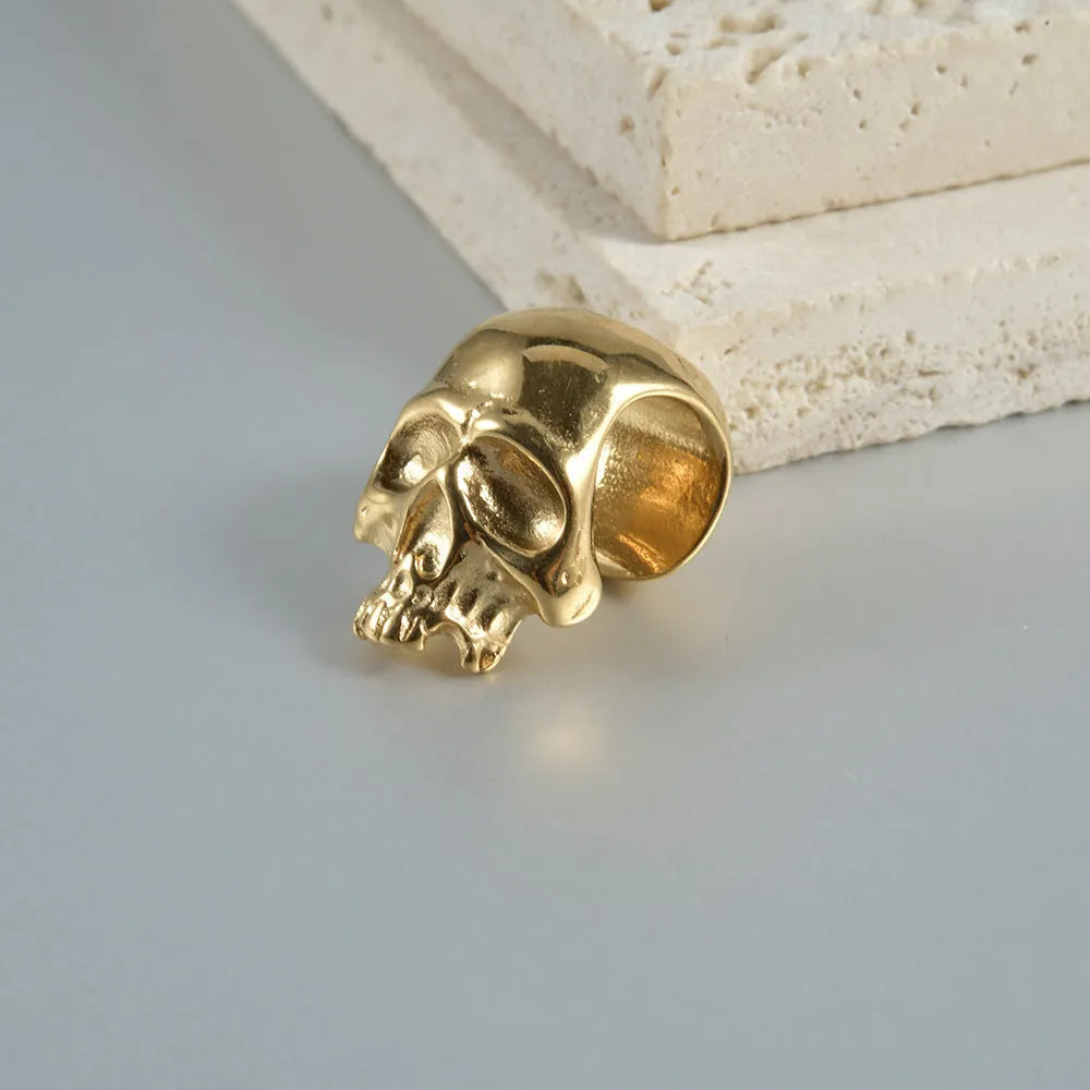 Stainless steel earrings with hollow skull and Buddha head geometric designs in multiple colour options