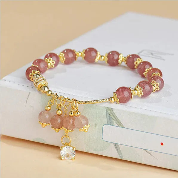 Pink strawberry quartz crystal bracelet with heart shapes and pearl accents for women