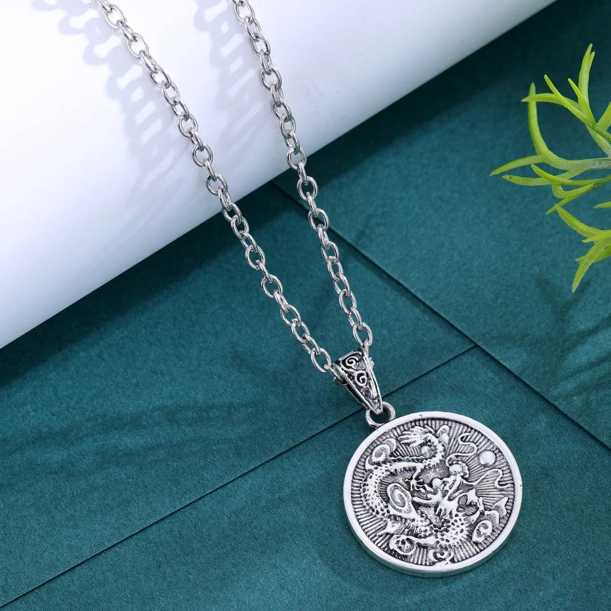 Retro round titanium steel pendant in gold finish with hip hop style