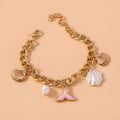 Women's shell pearl mermaid tail bracelet in white pearl alloy finish