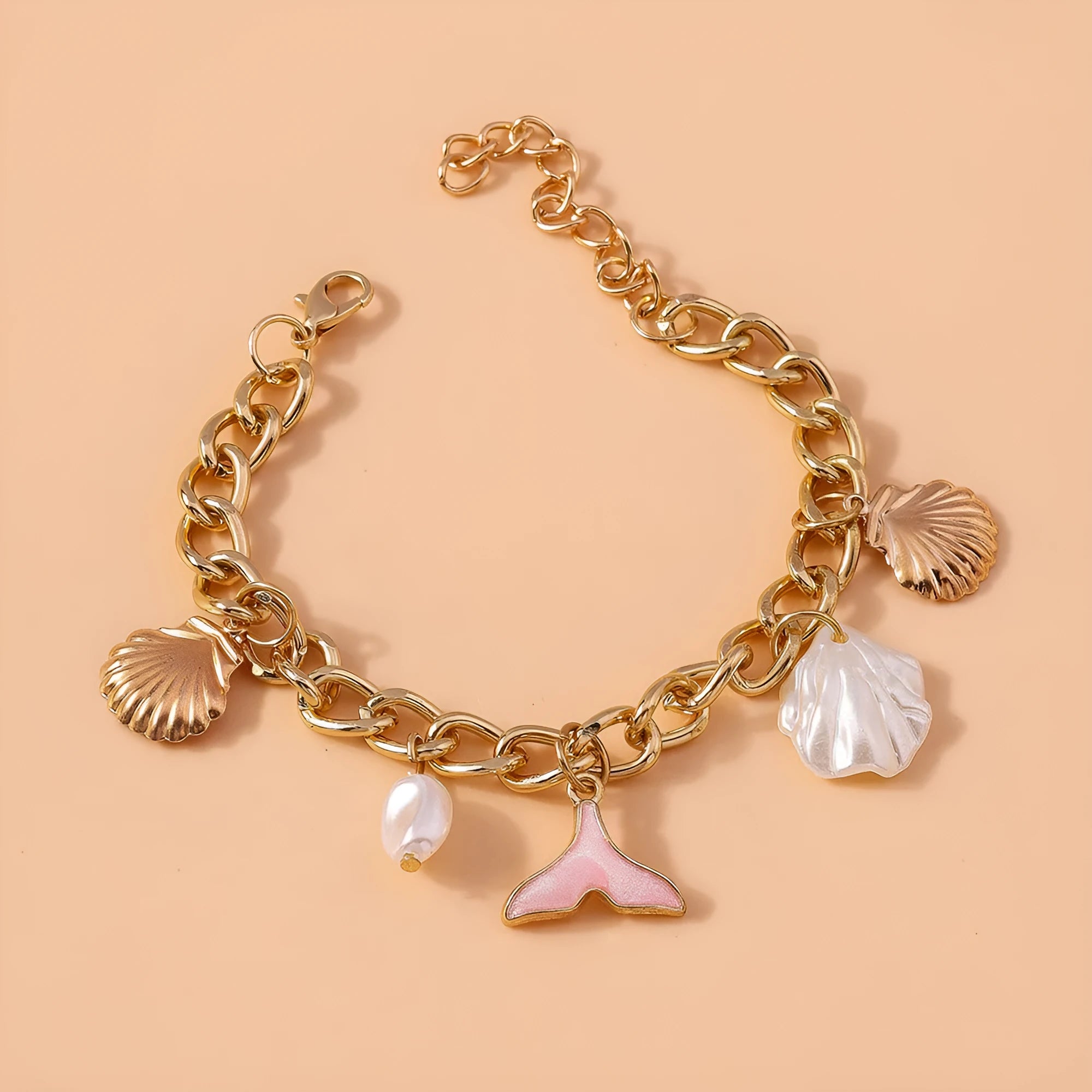 Women's shell pearl mermaid tail bracelet in white pearl alloy finish