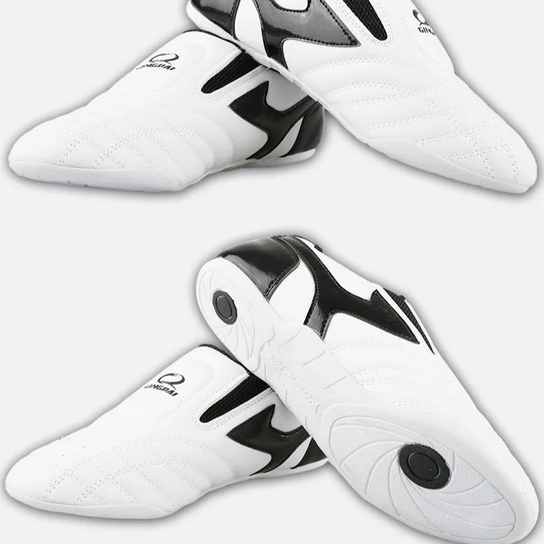 Black and white children's martial arts shoes with soft bottom and widened sole design