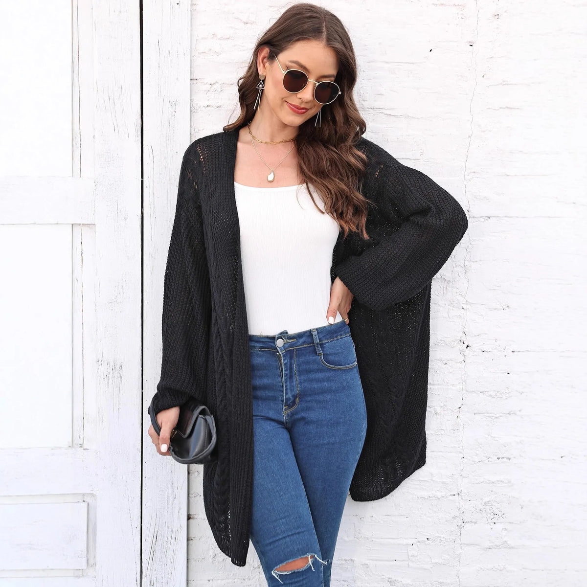 Women's loose casual acrylic cardigan in army green, shown front-on