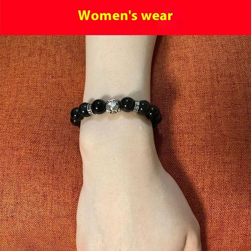 Obsidian and 999 silver beaded bracelet showing Jucai NAFU stone detail in two size options.