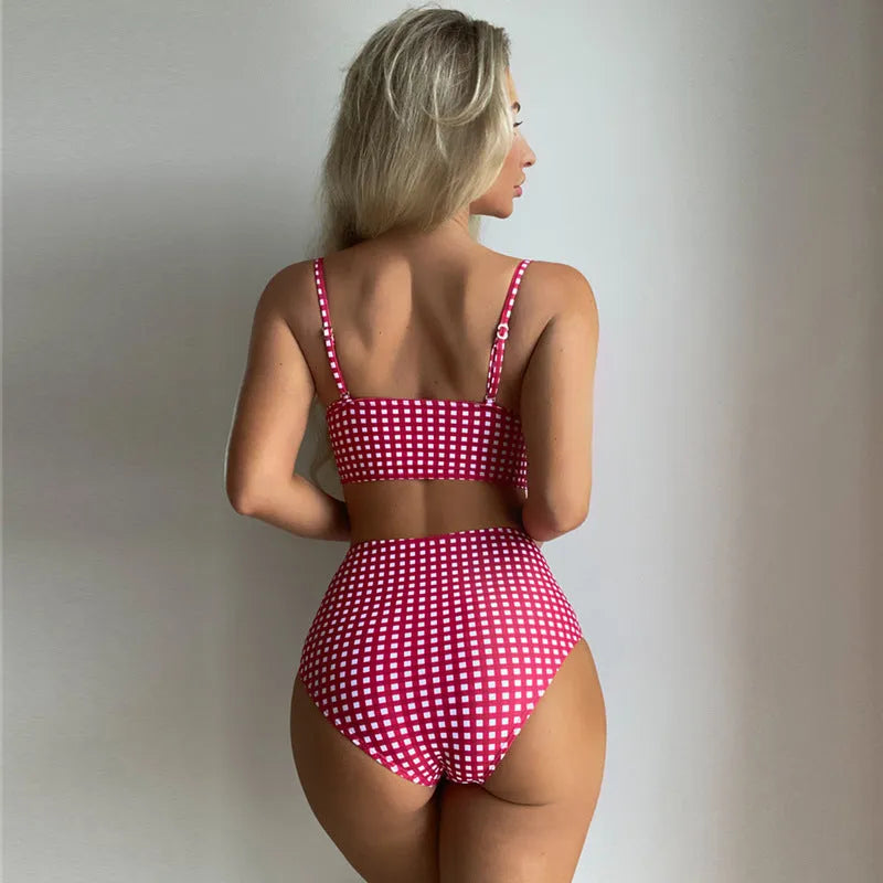 A rose red plaid bikini set showing the high-waisted swim briefs and matching top for women.