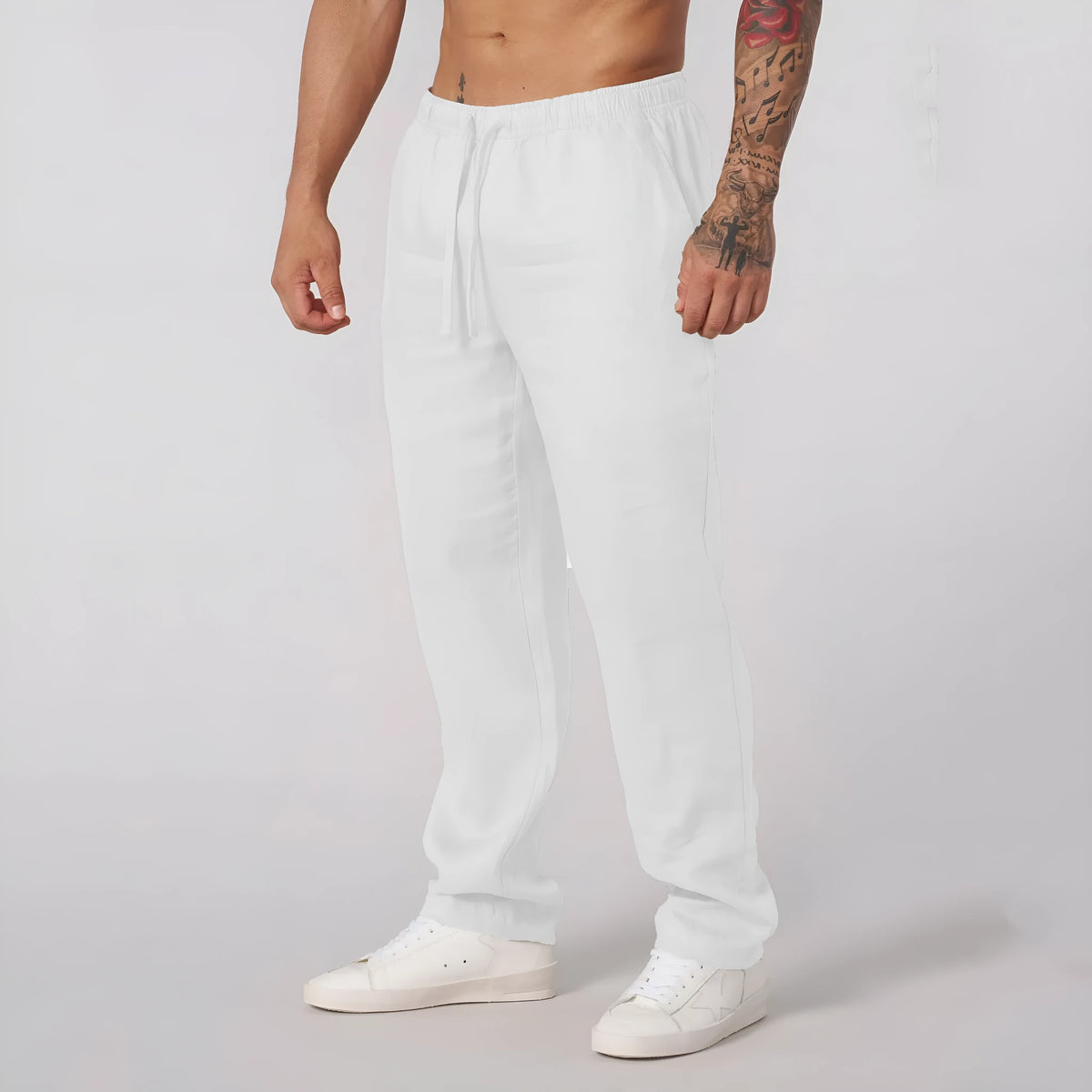 Men's casual sports trousers in polyester, available in white, black, khaki and sky blue, sizes S to XXL, no liner, regular length.