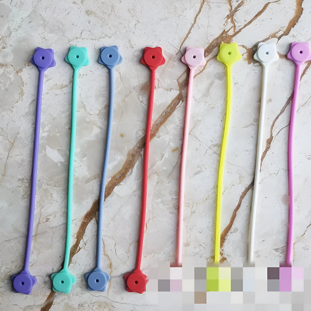 Star-shaped silicone wire winder with magnet for organising cables in multiple colours