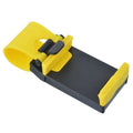 Black steering wheel phone clip mount holding smartphone with soft silicone padding visible