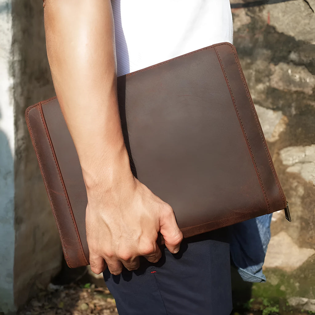 Genuine leather cowhide laptop protective case in brown with stitching and zipper closure