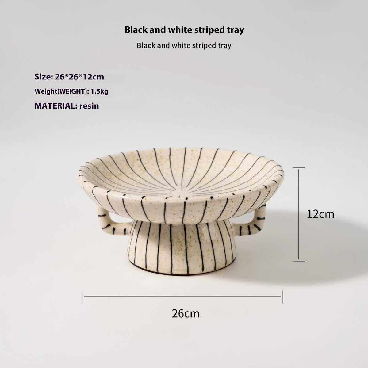 Black and white striped retro fruit plate on table with dessert