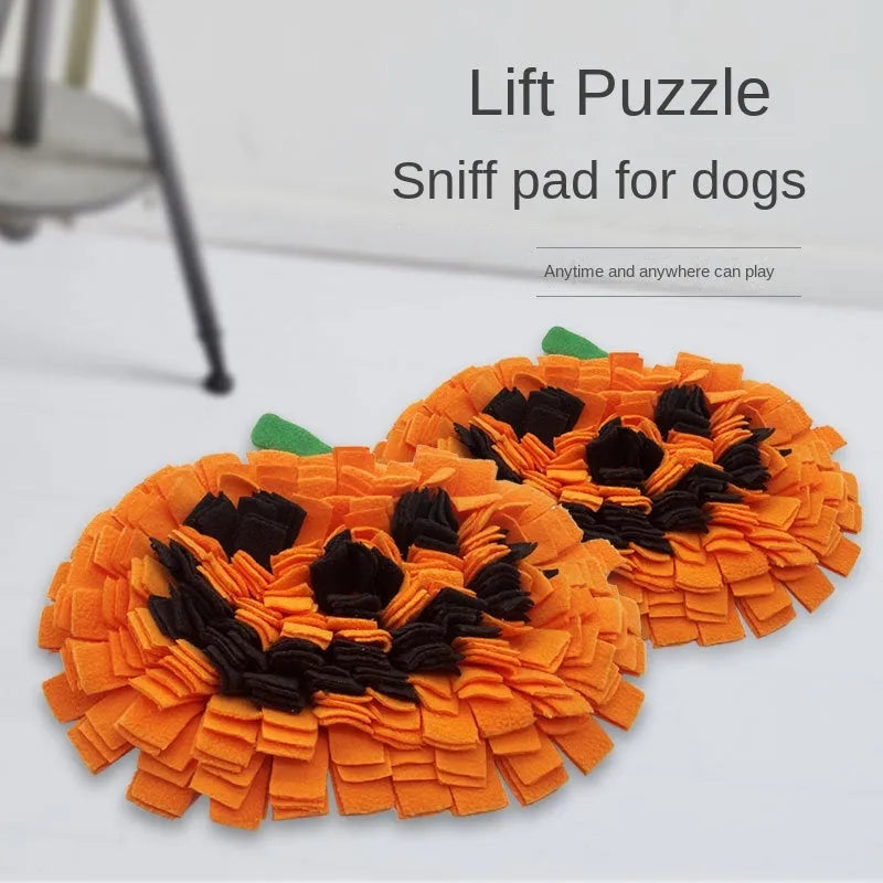 Orange pumpkin-shaped dog sniffing mat with soft fur texture for slow feeding training