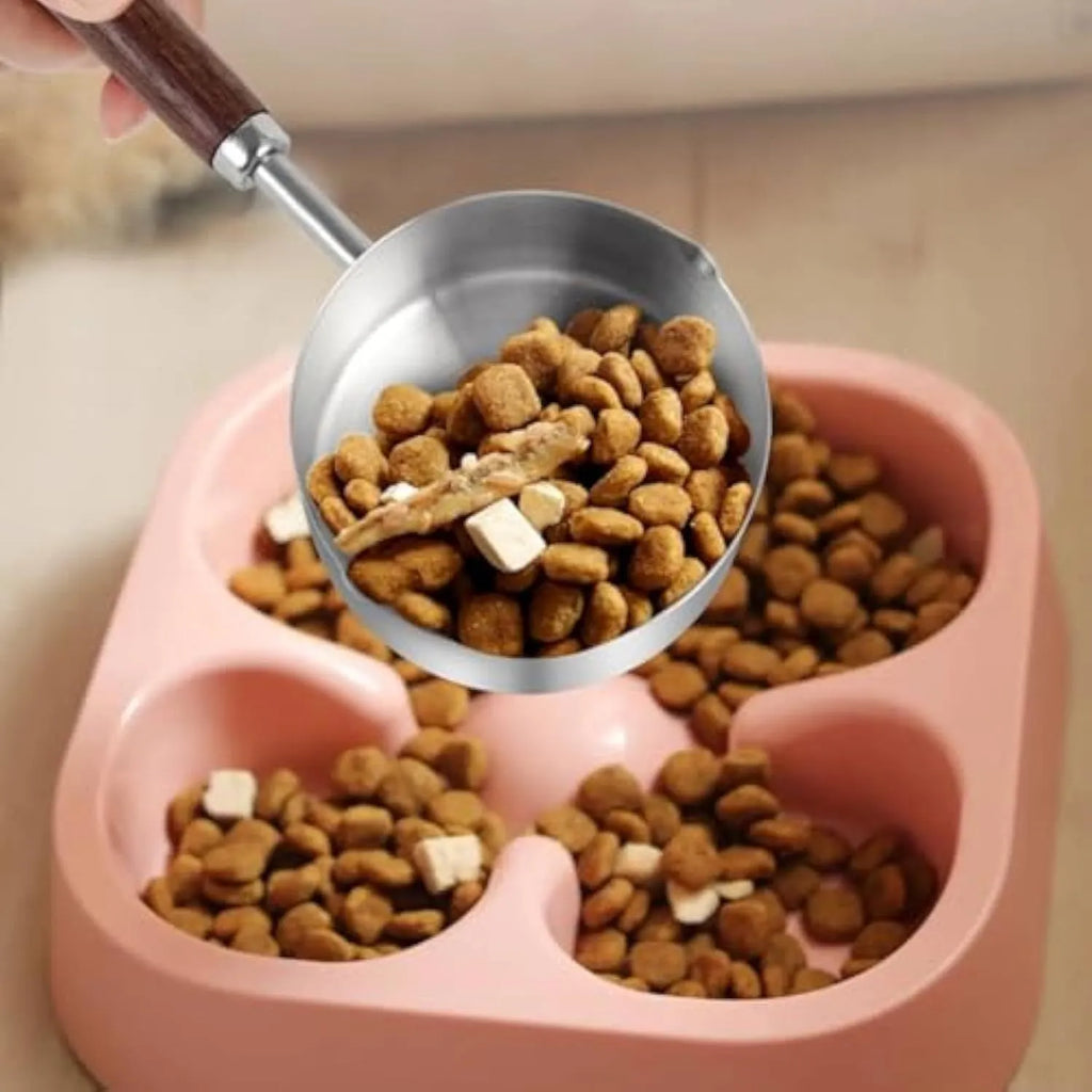 Two 304 stainless steel dog food scoops with wooden handles on a surface