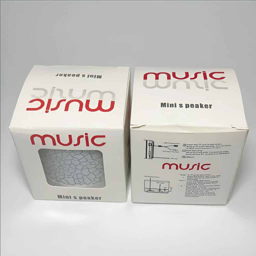 White A9 Mini Cracked Bluetooth Speaker with TF card slot and LED light