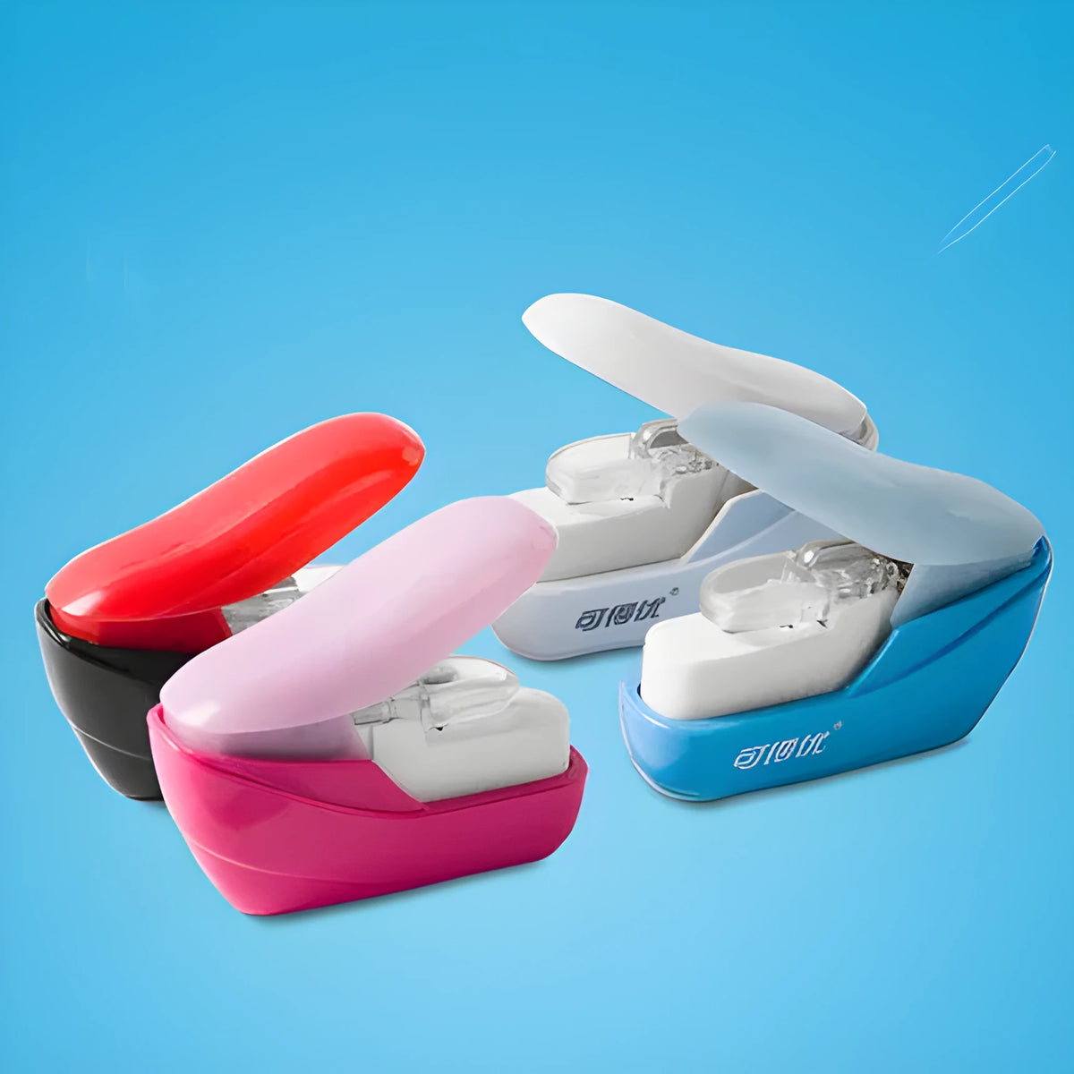 Stapler-free stapler embossed design ABS 50x25x50mm random colour compact