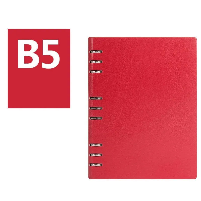 A5 loose-leaf business notebook with a black imitation leather cover, open to show beige paper.
