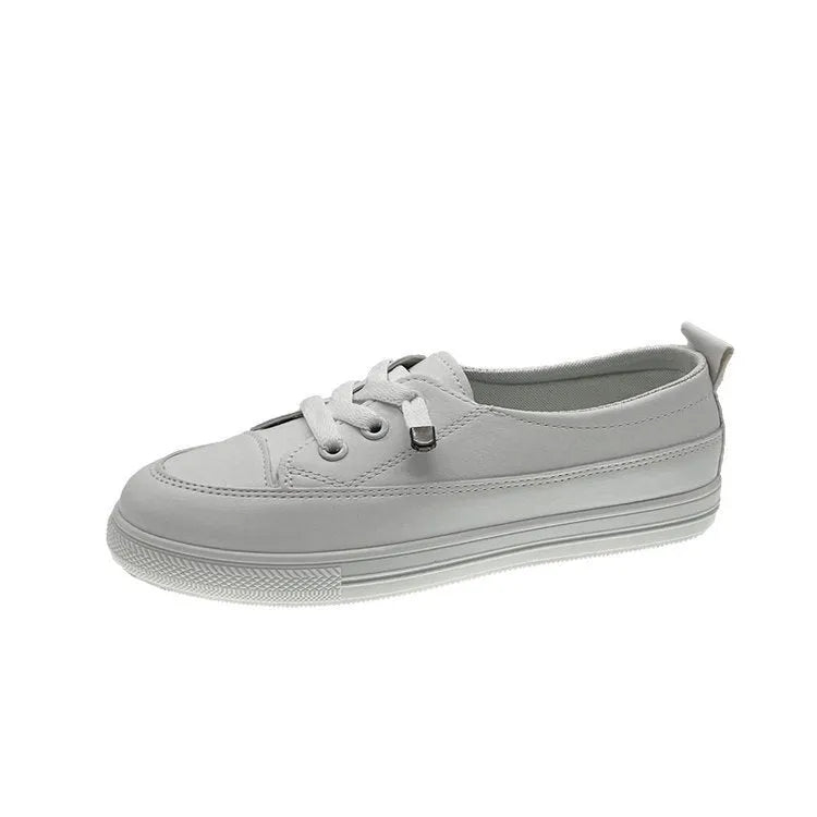 White women's sports shoes with flat heel, round toe, lace-up front, artificial PU upper, and rubber sole