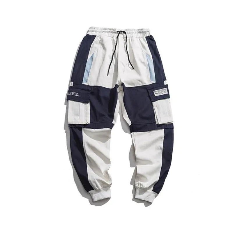 Men's loose fit hip hop beam pants in khaki cotton-rich fabric, mid waist, tether closure, small feet hem, available in black and white.