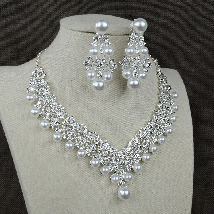 White pearl bridal jewellery set with necklace earrings and hair accessory with diamond accents style 0284