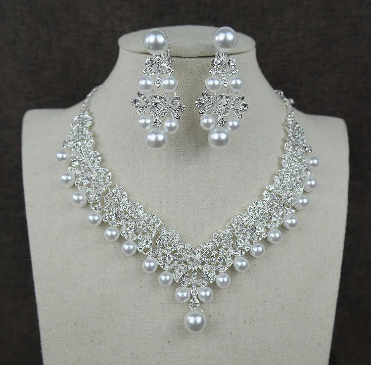White pearl bridal jewellery set with necklace earrings and hair accessory with diamond accents style 0284