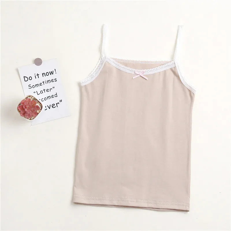Girls' pure cotton lace vest with bow detail, available in multiple colours and sizes for heights 100-150 cm