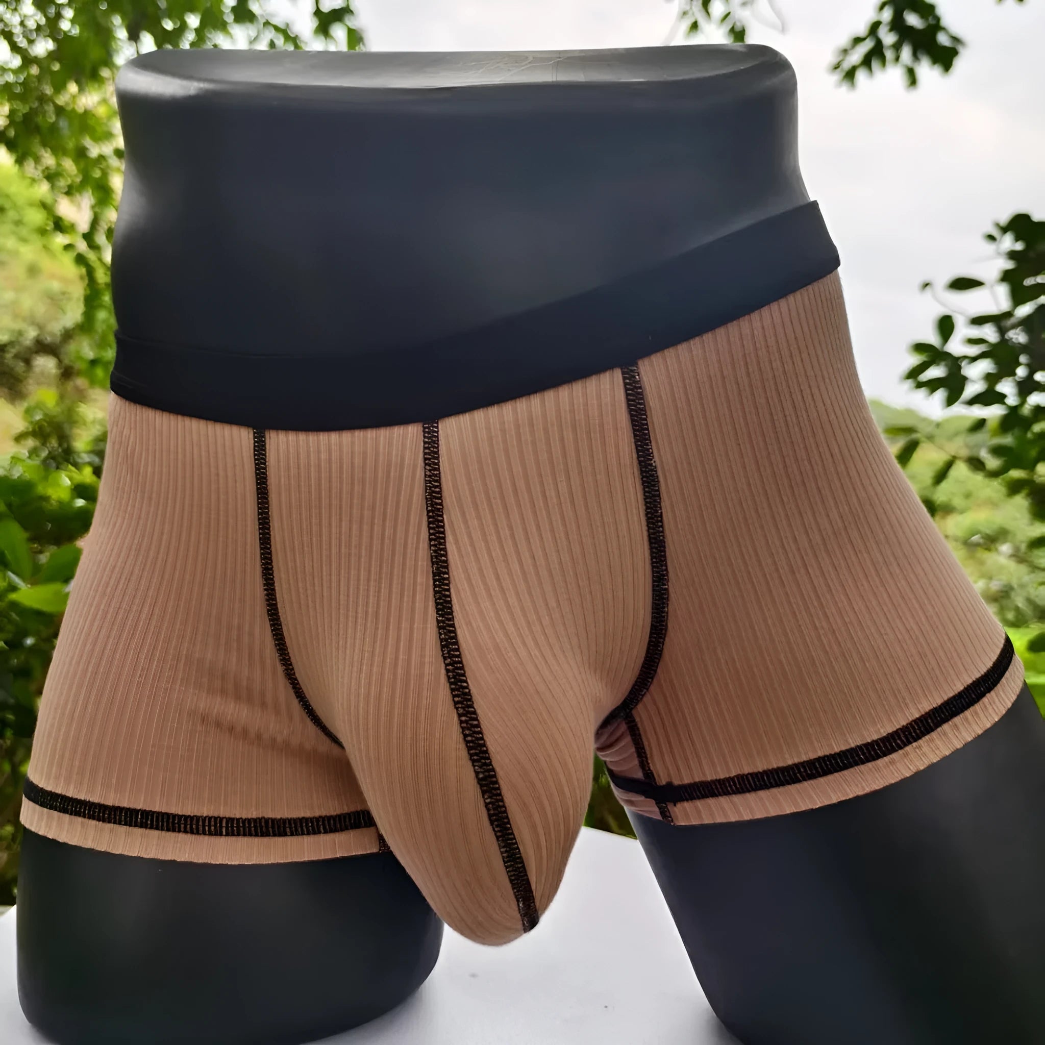 Men's solid colour breathable boxer shorts on a size chart showing weight ranges for L, XL, 2XL, and 3XL.