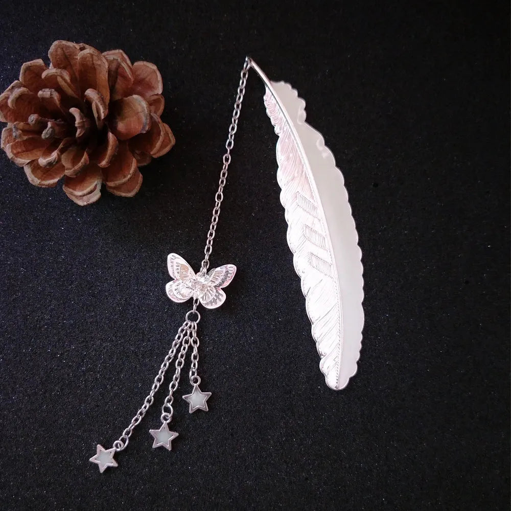 Luminous retro pure copper feather bookmark with silver finish and glow-in-the-dark butterfly design