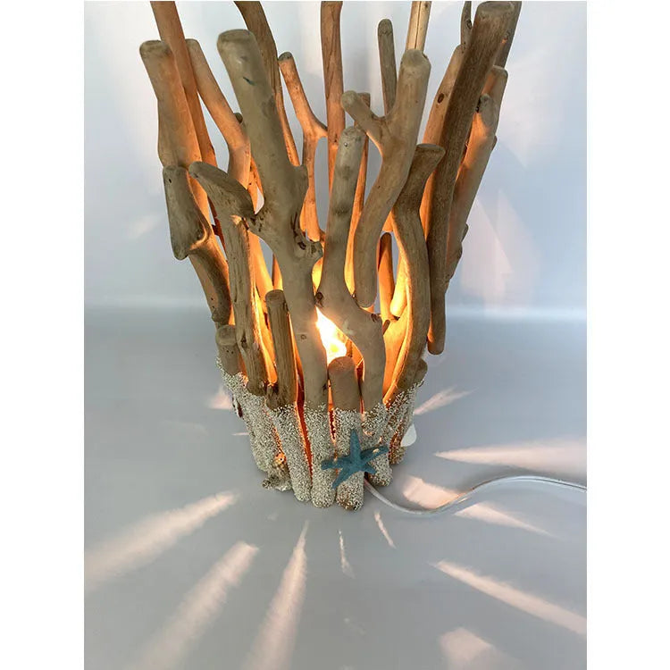 Driftwood decorative table lamp with wood colour finish and 24.5cm square base on a desk