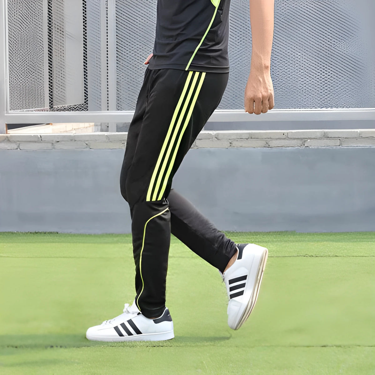 Men straight tube pants in fluorescent green with three-bar solid line design for outdoor fitness
