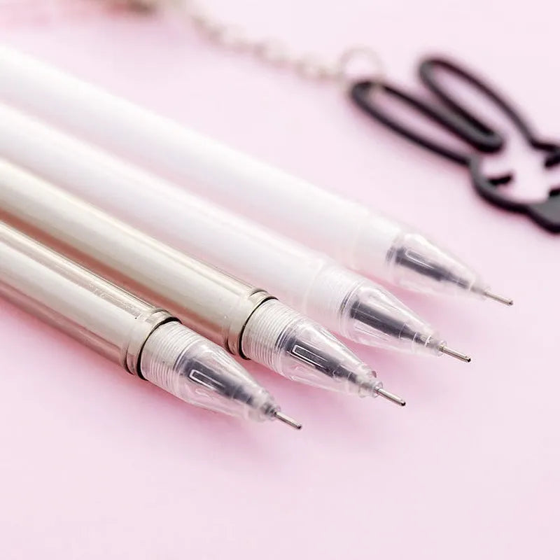 Plastic gel pen with decorative paper crane pendant and 0.38mm fine tip, shown at 17cm length.
