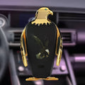 Wireless charging car phone holder with suction cup and Eagle style grip in black and gold.