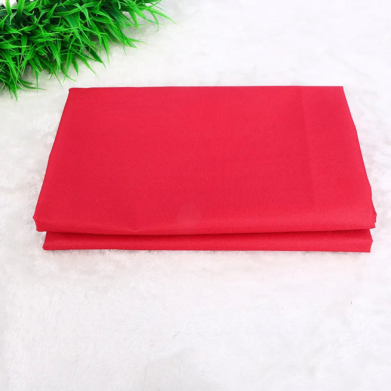 Red waterproof car pet pad for dogs and cats measuring 135cm square on a car seat