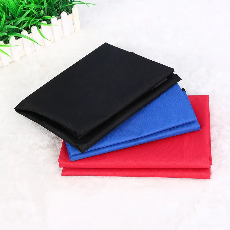 Red waterproof car pet pad for dogs and cats measuring 135cm square on a car seat