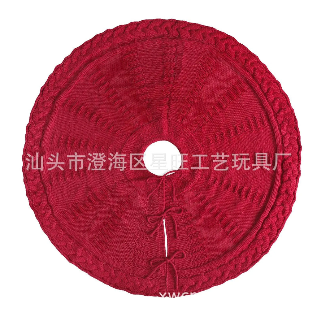 Round wool knitted Christmas tree skirt, 122cm diameter, in red or milky white, shown around a tree base