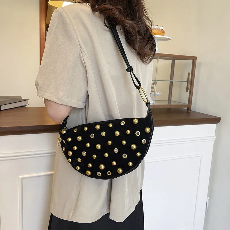Retro rivet bag in frosted imitation buckskin suede with dumpling shape and sewing line details