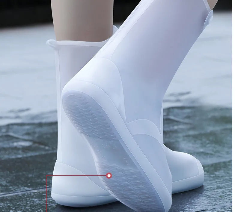 White high-top PVC reusable shoe covers for women with anti-skid sole.
